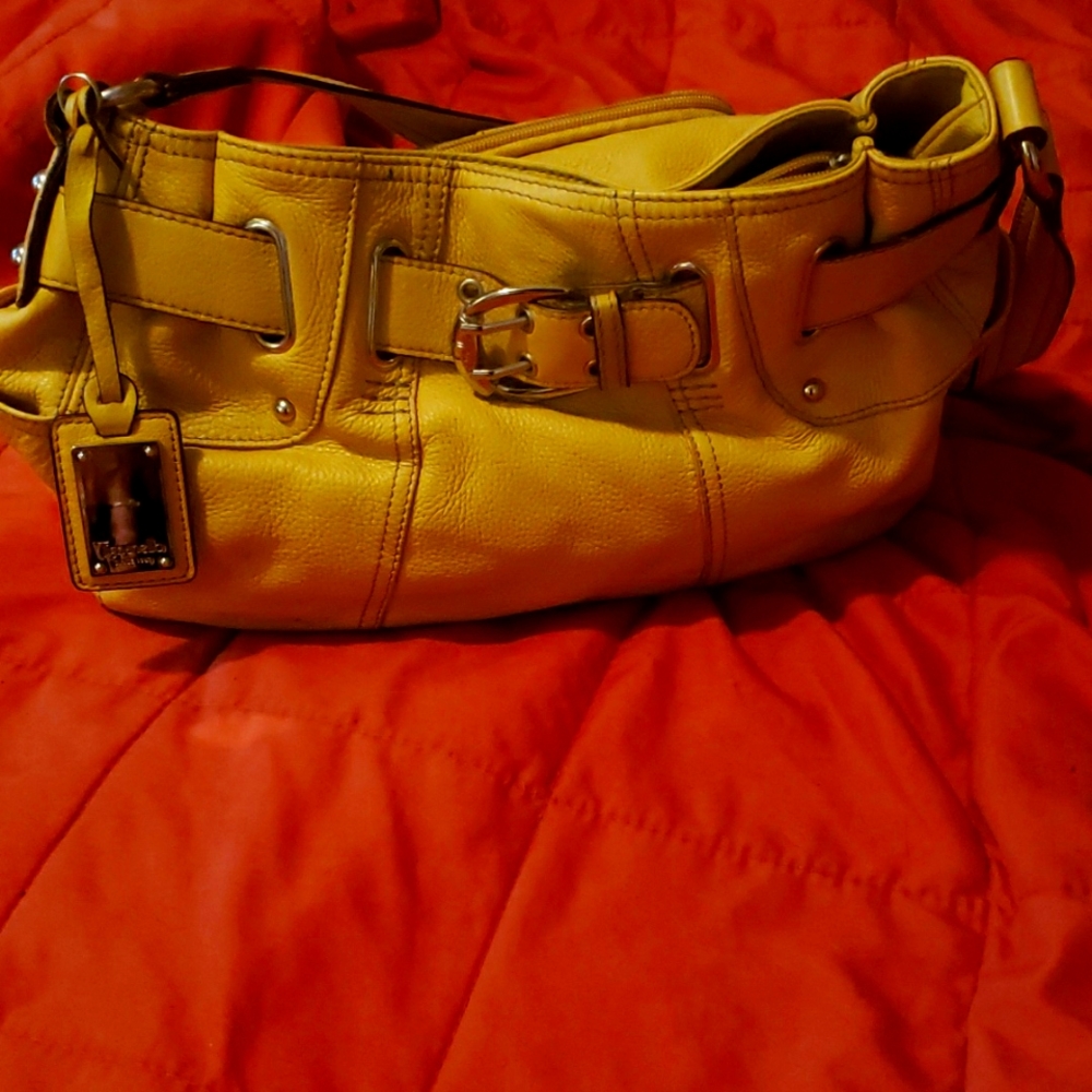 Tignanello purse. Gently used yellow. Needs a bath 😁